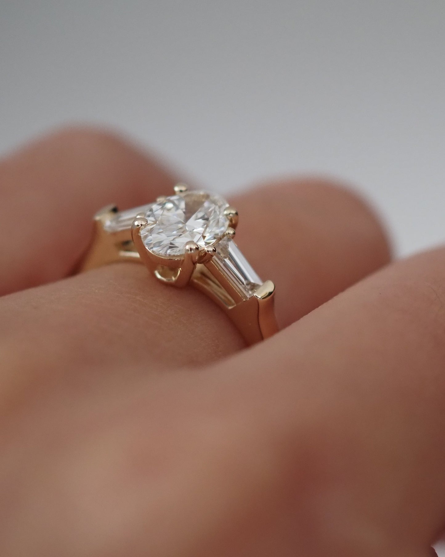 Oval Lab Diamond Three Stone Ring with Baguette Accents