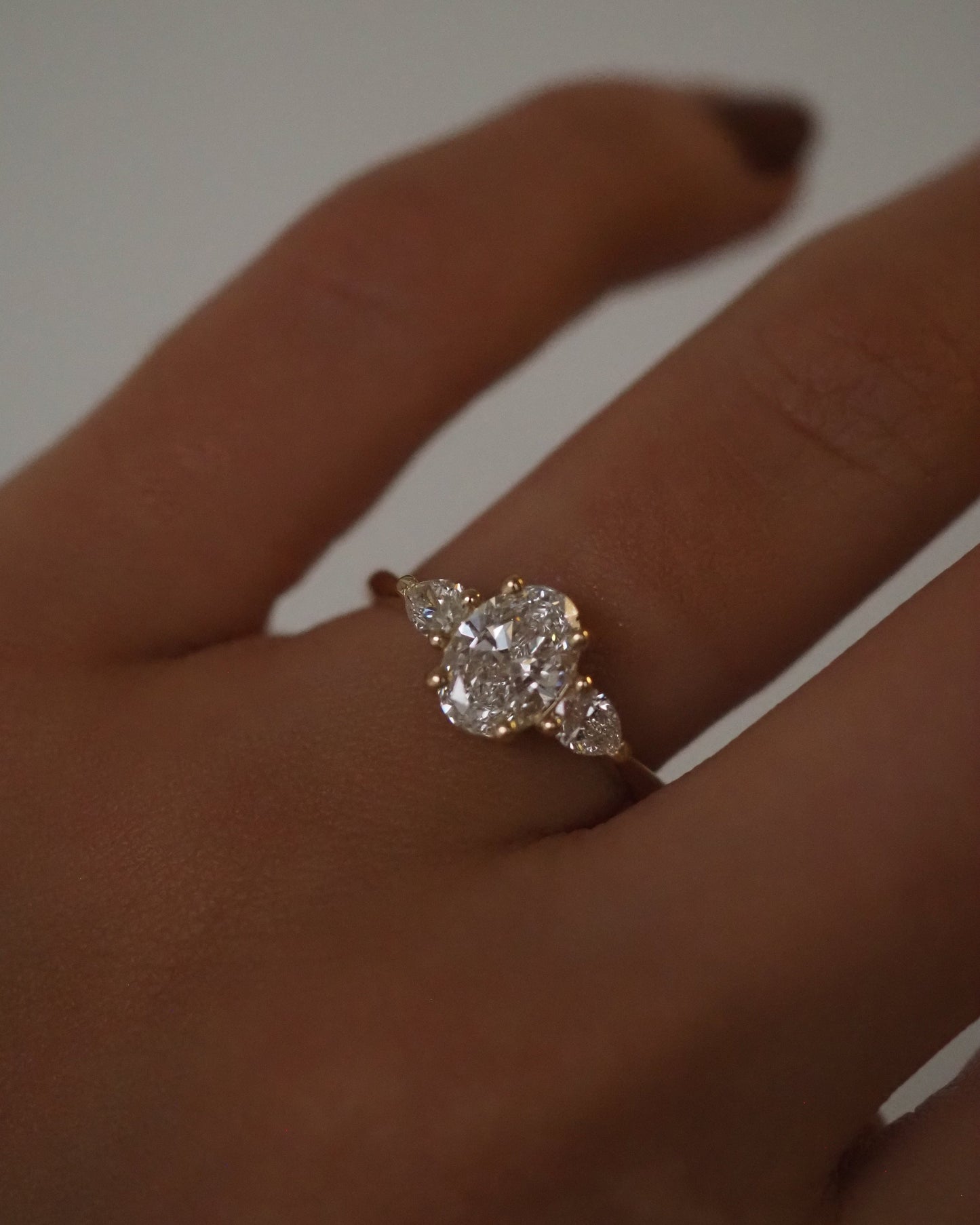 Oval Lab Diamond Three Stone Ring with Pear Accents