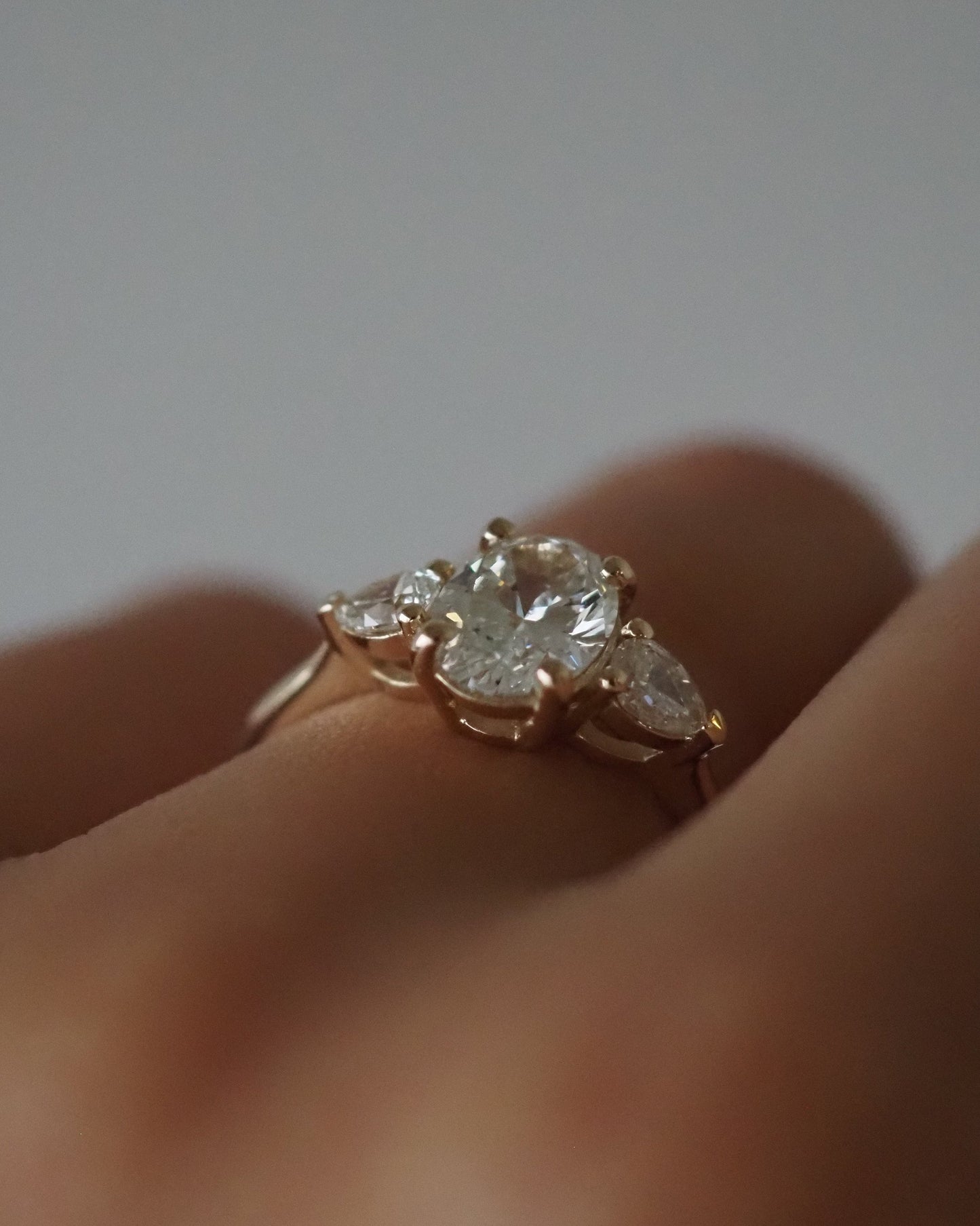 Oval Lab Diamond Three Stone Ring with Pear Accents