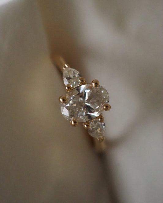 Oval Lab Diamond Three Stone Ring with Pear Accents