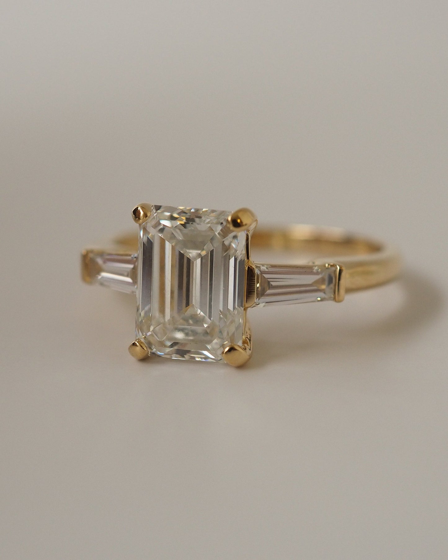 Emerald Lab Diamond Three Stone Ring with Baguette Accents