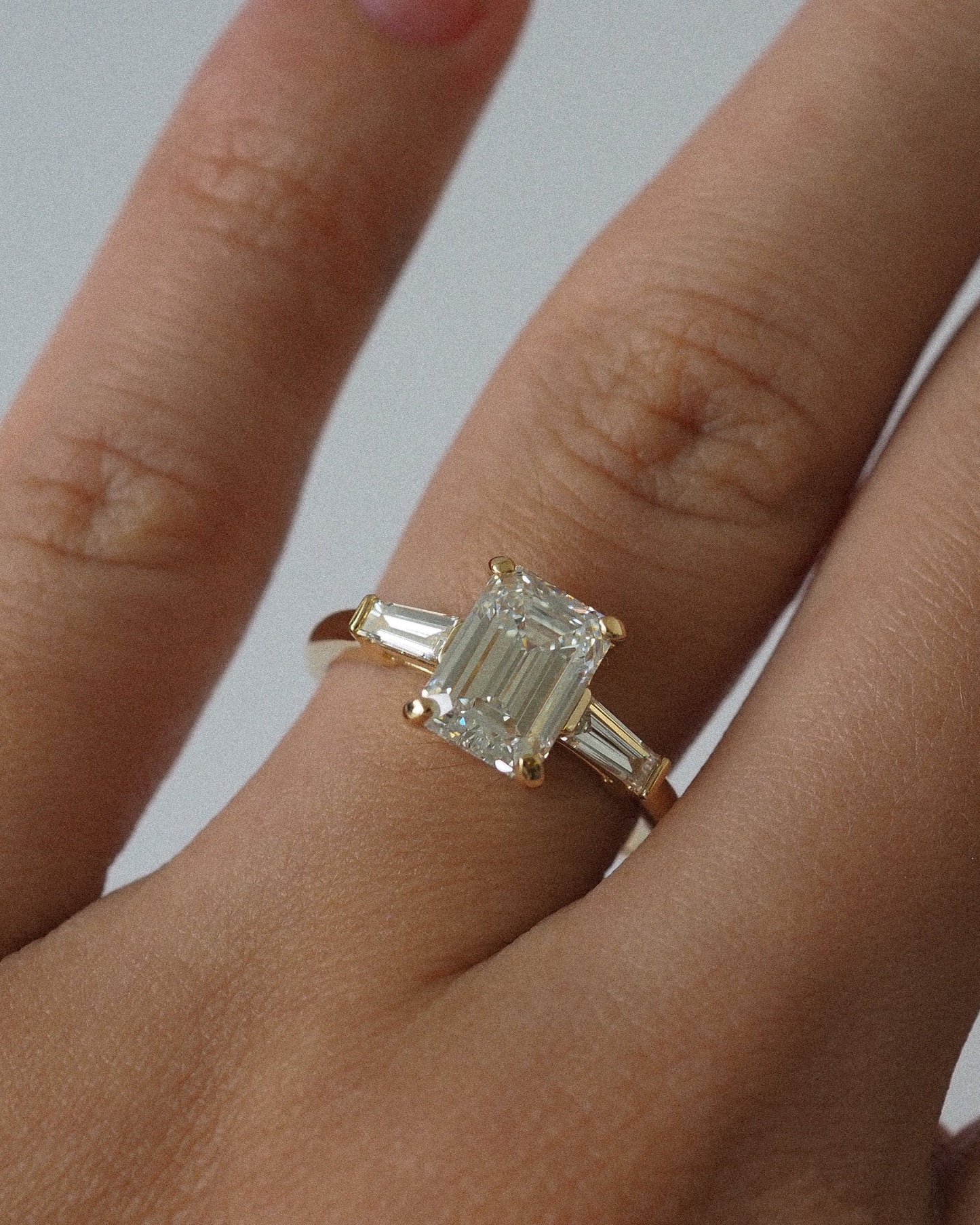 Emerald Lab Diamond Three Stone Ring with Baguette Accents