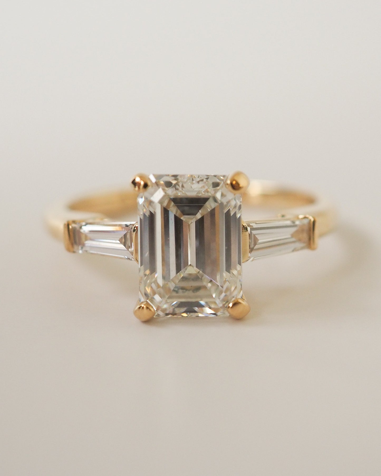 Emerald Lab Diamond Three Stone Ring with Baguette Accents