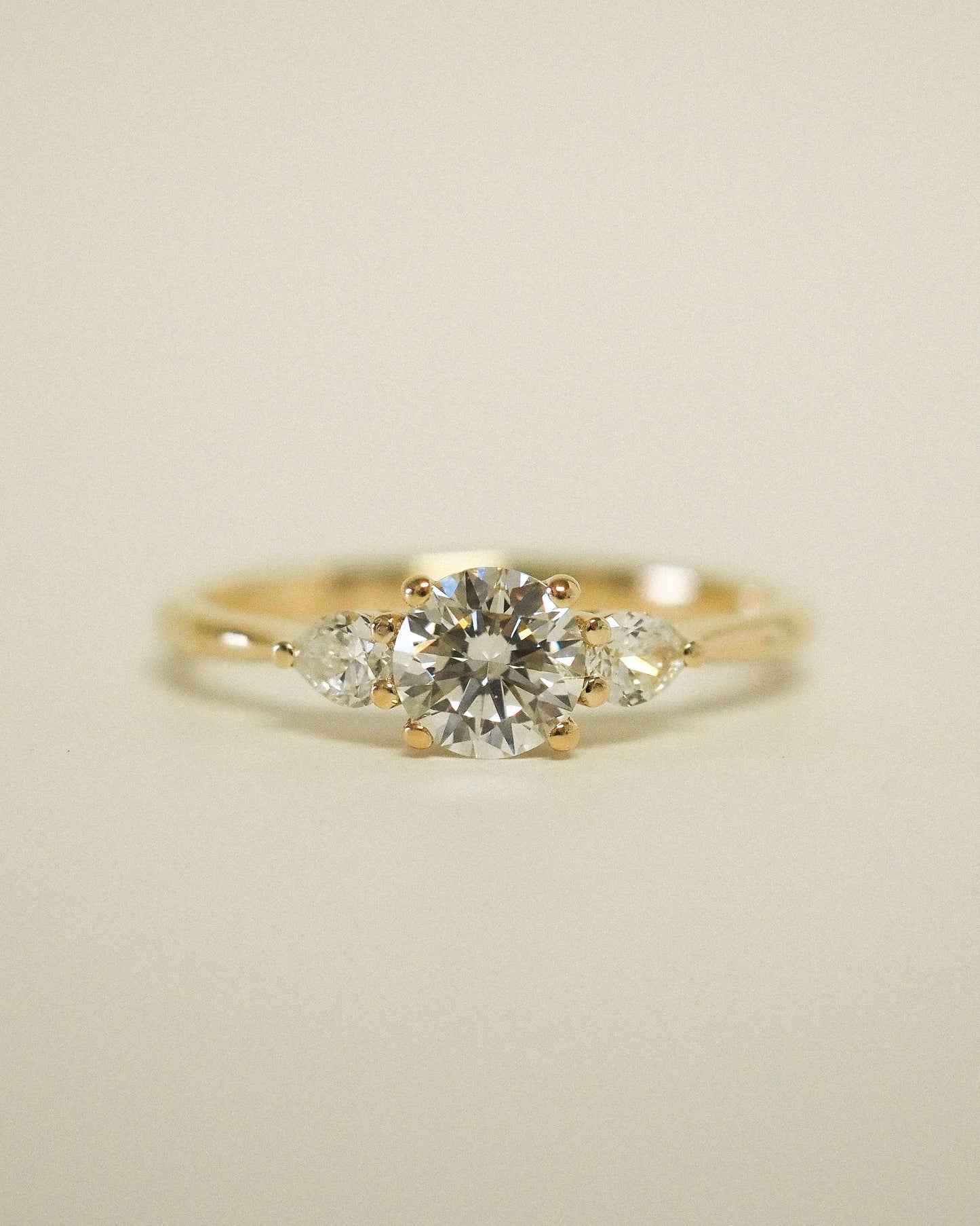 Round Lab Diamond Three Stone Ring with Pear Accents
