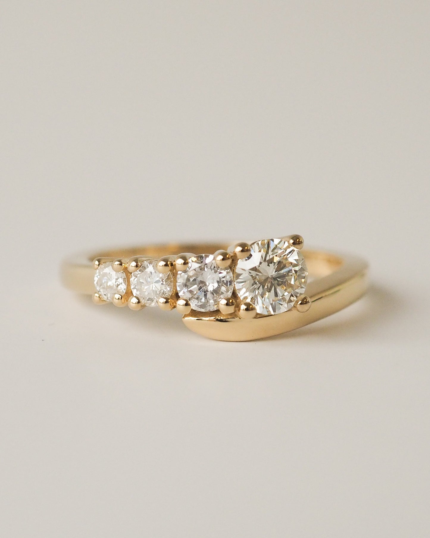 Round Lab Diamond Graduated Bypass Engagement Ring