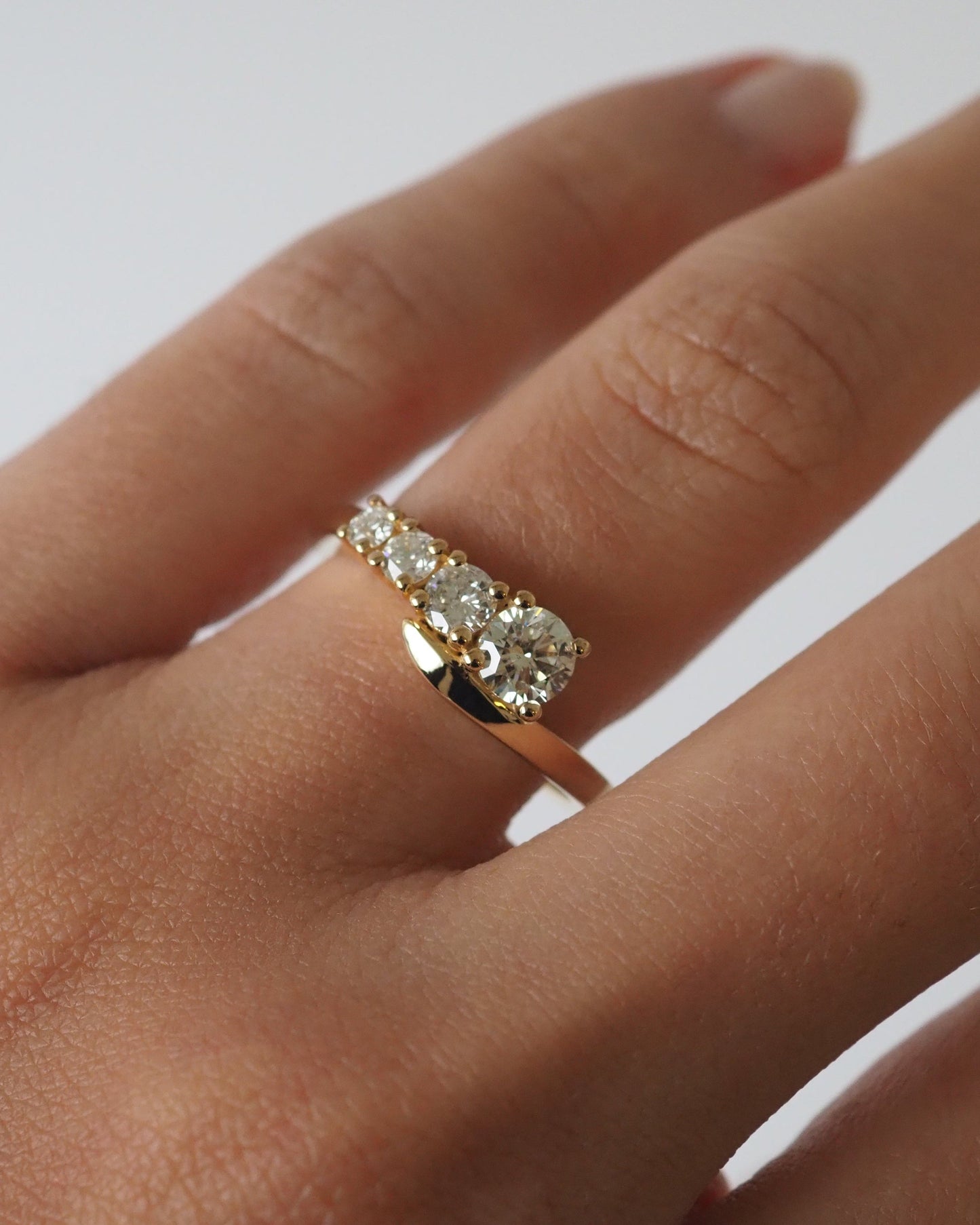 Round Lab Diamond Graduated Bypass Engagement Ring