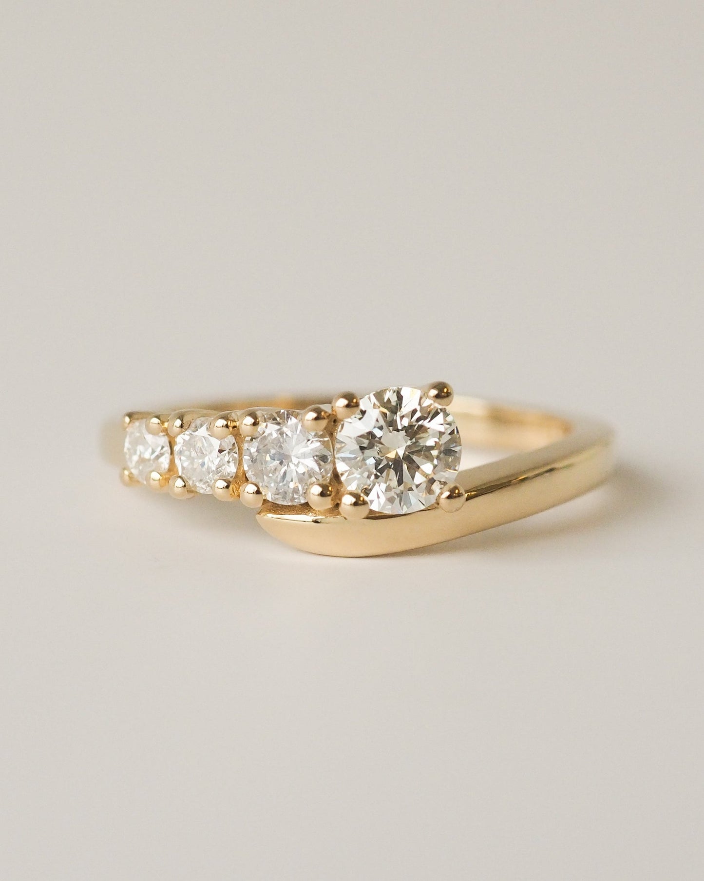 Round Lab Diamond Graduated Bypass Engagement Ring