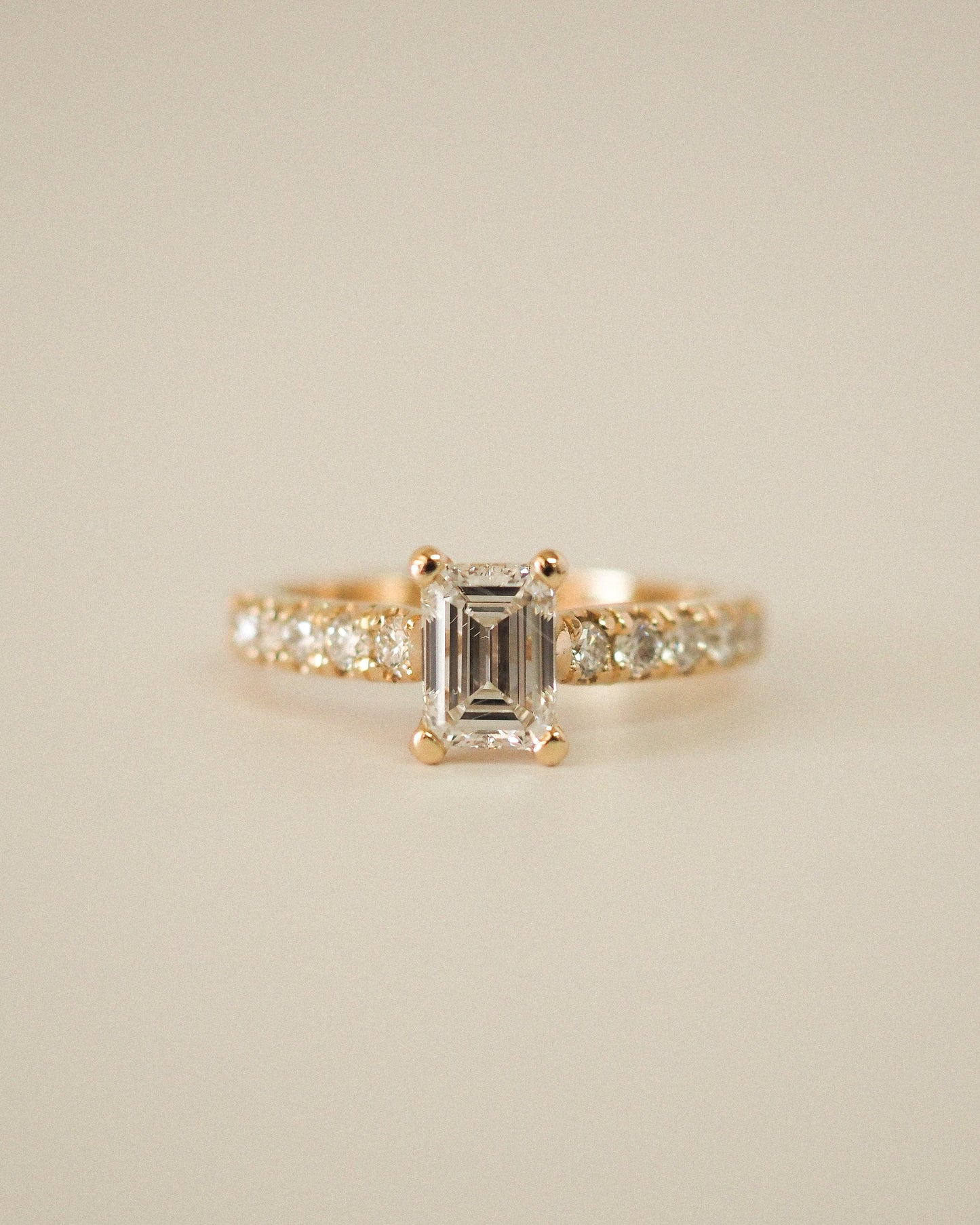 Emerald Lab Diamond Solitaire Ring with Pavé Band