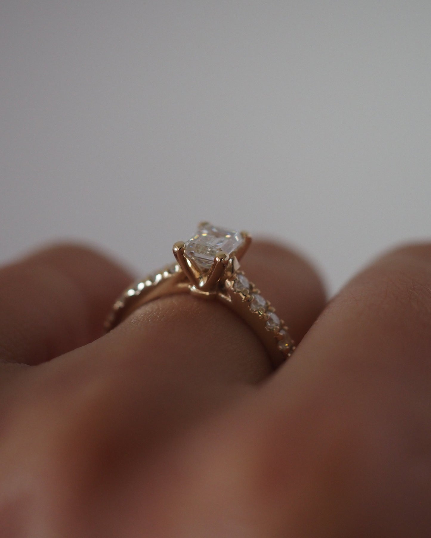 Emerald Lab Diamond Solitaire Ring with Pavé Band