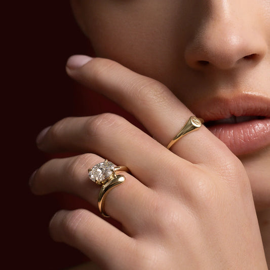 Oval Lab-Grown Diamond Solitaire Engagement Ring with Bypass Band