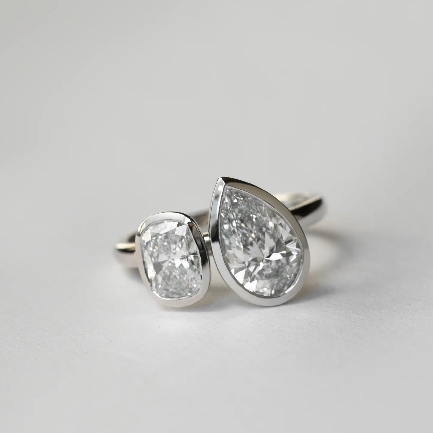 Oval & Pear Lab-Grown Diamond Bezel-Set Toi et Moi Engagement Ring