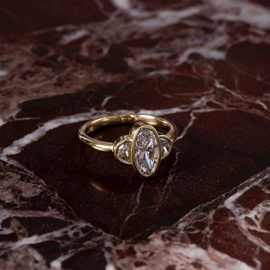 Oval & Half-Moon Lab-Grown Diamond Three Stone Bezel Engagement Ring