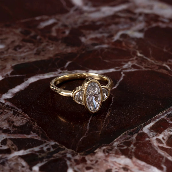 Oval & Half-Moon Lab-Grown Diamond Three Stone Bezel Engagement Ring