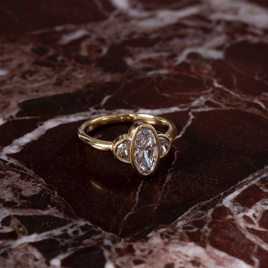 Oval & Half-Moon Lab-Grown Diamond Three Stone Bezel Engagement Ring