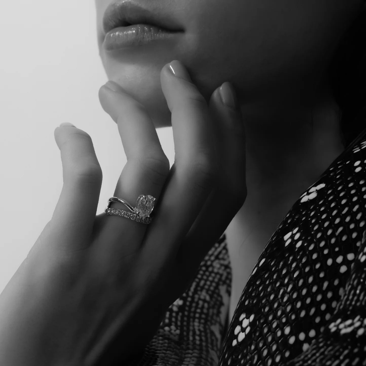Oval Lab-Grown Diamond Solitaire Engagement Ring with Pavé Bypass Band