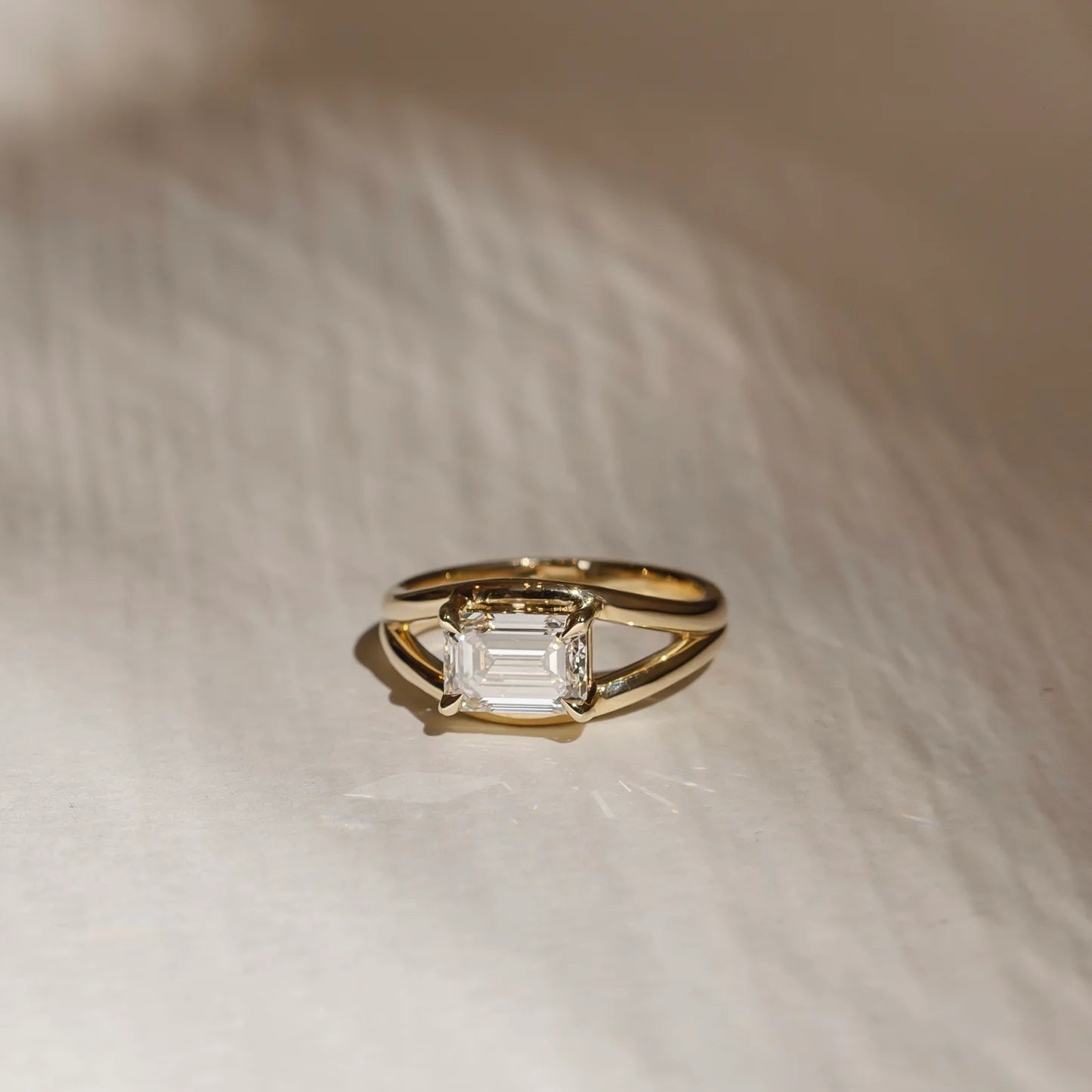 East-West Emerald Cut Lab-Grown Diamond Solitaire Engagement Ring with Split Shank