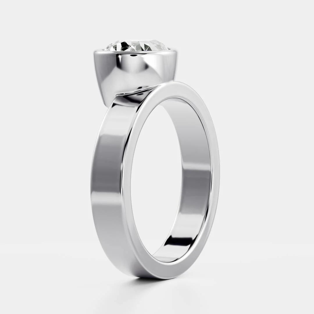 East-West Pear Cut Lab-Grown Diamond Bezel Engagement Ring with Wide Band