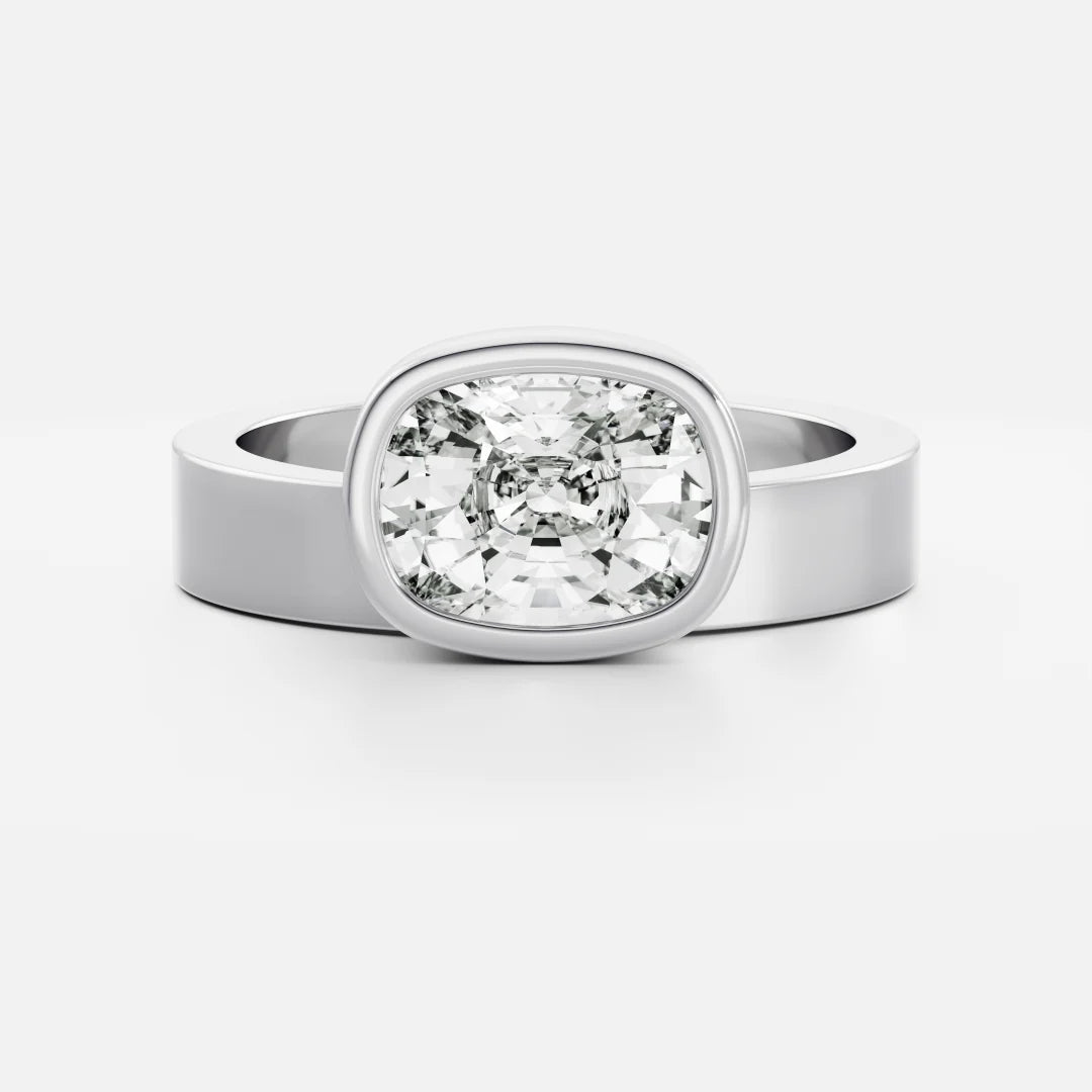 East-West Elongated Cushion Cut Lab-Grown Diamond Bezel Engagement Ring with Wide Band